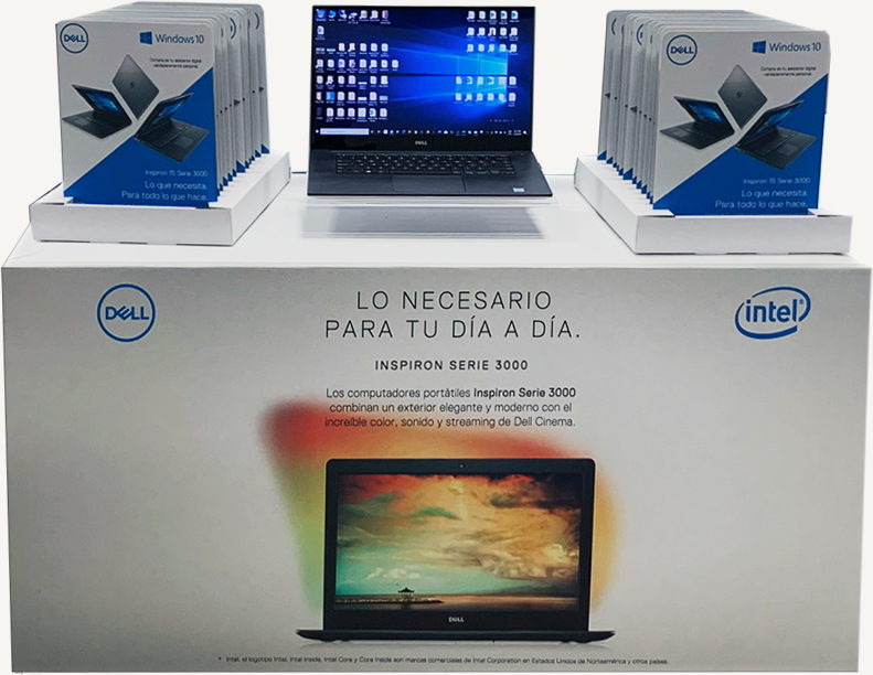 Dell pallet display with an open laptop and stacks of Inspiron boxes