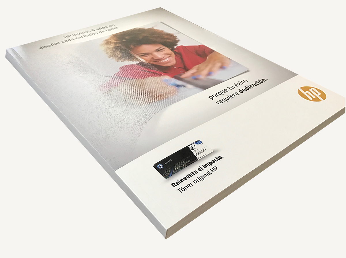 HP catalog open to a page about original toner
